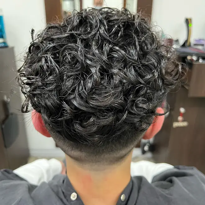 Textured men's perm, freshly styled